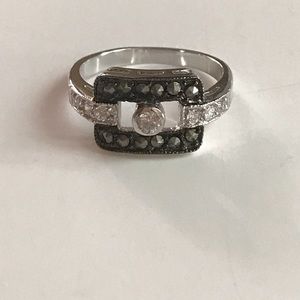 Silver rhodium and marcasite ring with CZ.